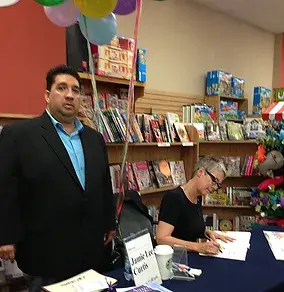 AESS protection agent standing by at an author book signing